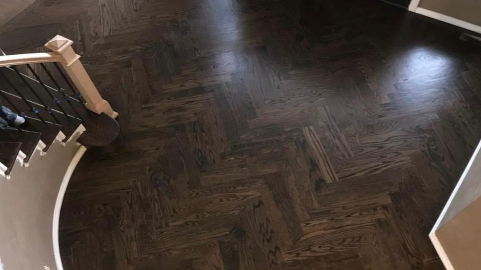 F&S Hardwood Floors technician installing solid hardwood flooring in a Denver metro home